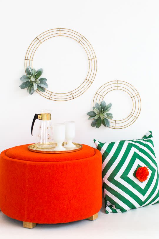 <p>We're all about a minimalist, understated approach to holiday decor, like this geometric wreath from <a href="https://sugarandcloth.com/simple-diy-geometric-wreath/" rel="nofollow noopener" target="_blank" data-ylk="slk:Sugar & Cloth;elm:context_link;itc:0;sec:content-canvas" class="link ">Sugar & Cloth</a>. Plus, minimalist crafts and DIY projects are by definition easy to make!</p>