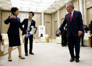 IOC President Thomas Bach (R) meets Tokyo Governor Yuriko Koike at Tokyo Metropolitan Government Building in Tokyo, Japan, October 18, 2016. REUTERS/Kim Kyung-Hoon