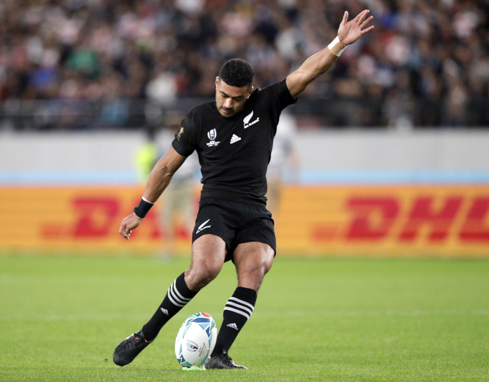 FILE - In this Nov. 1, 2019, file photo, New Zealand's Richie Mo'unga kicks a conversion during the Rugby World Cup bronze final game against Wales at Tokyo Stadium, in Tokyo. New All Blacks head coach Ian Foster opted for the in-form Mo'unga at No. 10 ahead of the incumbent Beauden Barrett, a two-time World Rugby Player of the Year who will start at fullback in the first Bledisloe Cup test against Australia, Sunday, Oct. 11, 2020. (AP Photo/Mark Baker, File)