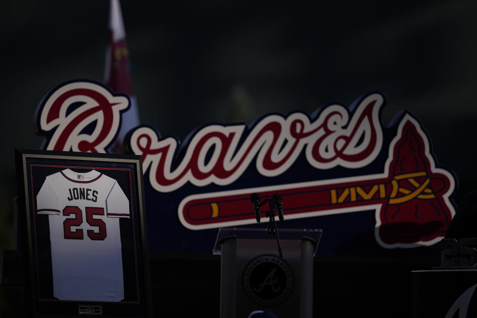 Former Atlanta Braves player, Andruw Jones' number is seen he is honored, Saturday, Sept. 9, 2023, in Atlanta. Jones who won 10 Gold Gloves in a career that began with 12 seasons in Atlanta, became the 11th Braves player or manager to have his number retired on Saturday night. The honor could add momentum to his candidacy for the Baseball Hall of Fame. Jones' 25 was retired before the Braves' game against the Pittsburgh Pirates. (AP Photo/Brynn Anderson)