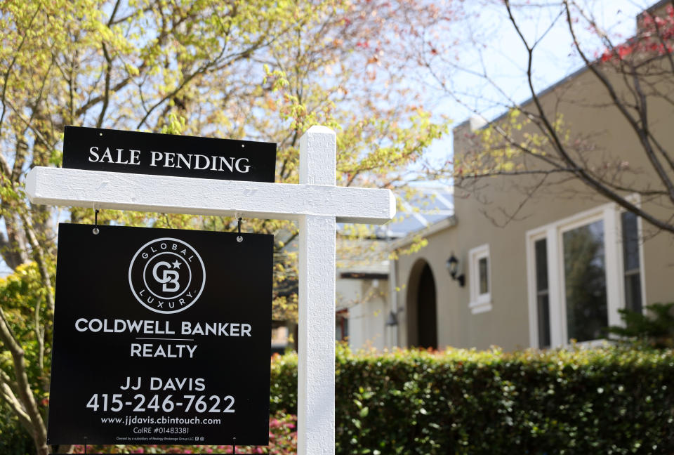 A sale pending sign is posted in front of a home for sale on March 18, 2022 in San Anselmo, California. Sales of existing homes dropped 7.2 percent in February as mortgage rates top 4 percent. (Photo by Justin Sullivan/Getty Images)