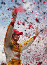 TORONTO, ON - JULY 08: Ryan Hunter-Reay, driver of the #28 Team DHL/Sun Drop Citrus Soda Chevrolet, celebrates winning during the IZOD INDYCAR Series Honda Indy Toronto on July 8, 2012 in Toronto, Canada. (Photo by Nick Laham/Getty Images)