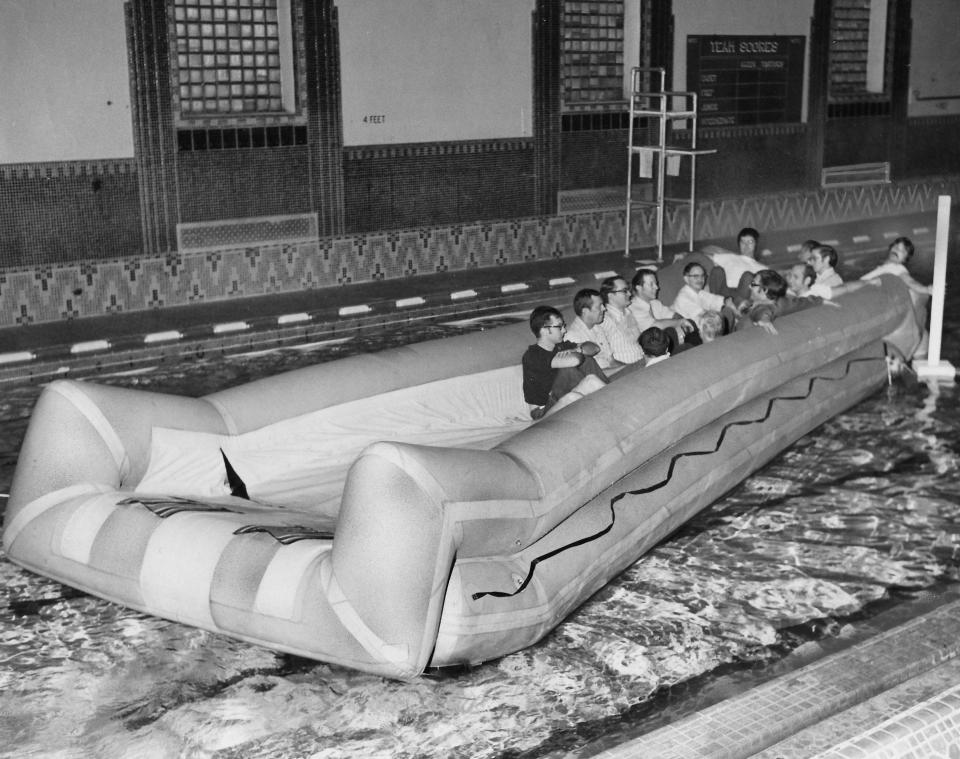 B.F. Goodrich uses the Akron YMCA pool in 1973 to test an inflatable escape slide that can double as a raft.