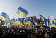 People take part in a rally ahead of the so-called "Normandy" format summit, in Kiev