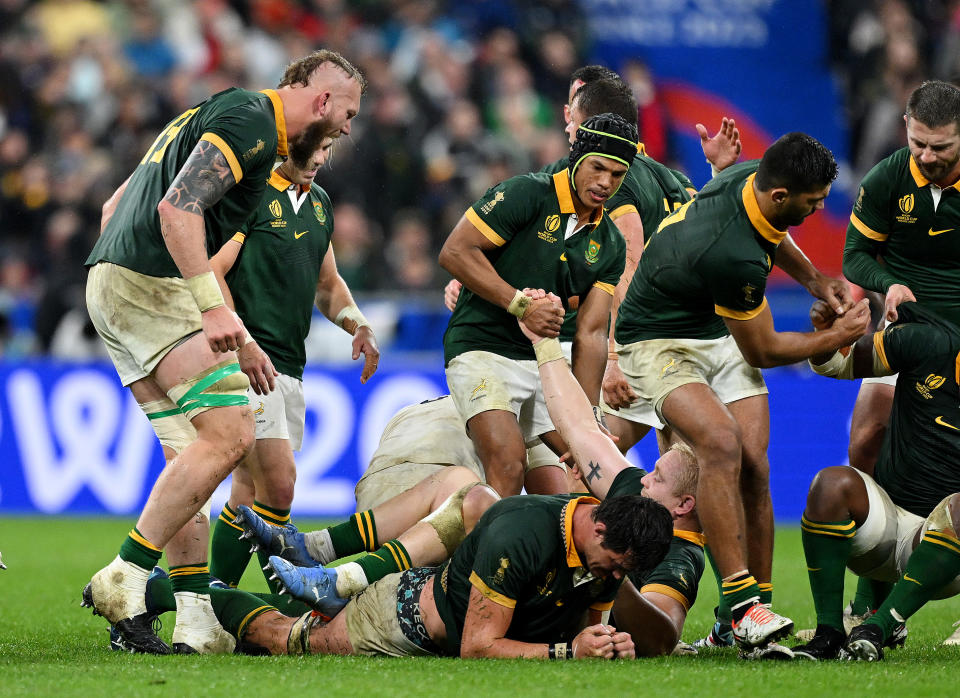 PARIS, FRANCE - OCTOBER 21: The players of South Africa celebrate as Referee Ben O’Keeffe (not pictured) awards a penalty during the Rugby World Cup France 2023 match between England and South Africa at Stade de France on October 21, 2023 in Paris, France. (Photo by Hannah Peters/Getty Images)