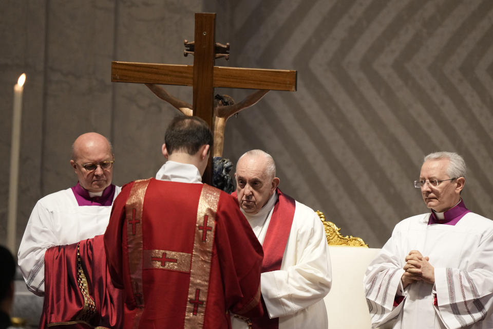 Pope Francis celebrates the Passion Mass on Good Friday, inside St. Peter's Basilica, at the Vatican, Friday, April 7, 2023. (AP Photo/Andrew Medichini)
