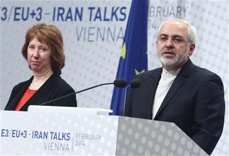 European Union foreign policy chief Catherine Ashton (L) and Iranian Foreign Minister Mohammad Javad Zarif deliver a press statement after a conference in Vienna February 20, 2014. REUTERS/Heinz-Peter Bader