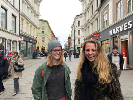 Karen Nerbo (L) and Kristina Davidsen pose for a picture in Oslo, Norway March 20, 2017. "We have a lot of things to be happy about, our society is very open, we have everything that we need, there is not much to complain about," said Nerbo. REUTERS/Lefteris Karagiannopoulos