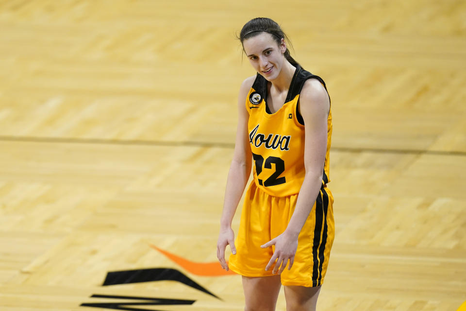 Iowa guard Caitlin Clark reacts during the second half of the team's NCAA college basketball game against Ohio State, Wednesday, Jan. 13, 2021, in Iowa City, Iowa. Clark, one of the top scorers in the nation, has been named the Big Ten's player of the week three times this season and has won the conference's freshman of the week honor six times. (AP Photo/Charlie Neibergall)