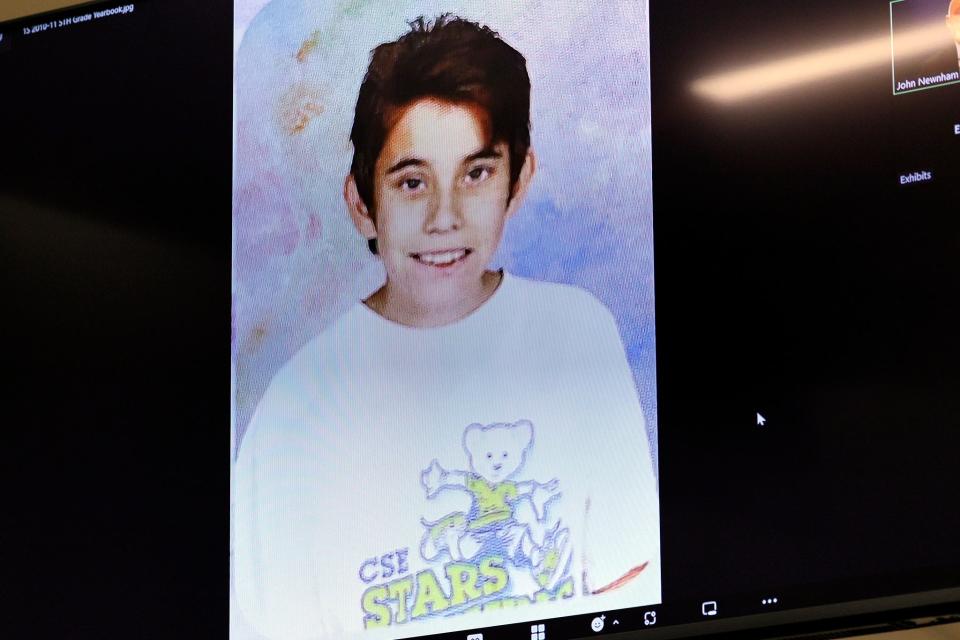 A fifth grade photo from Coral Springs Elementary School of Marjory Stoneman Douglas High School shooter Nikolas Cruz is shown in court during the penalty phase of Cruz’s trial at the Broward County Courthouse in Fort Lauderdale on Tuesday, August 23, 2022. Cruz previously plead guilty to all 17 counts of premeditated murder and 17 counts of attempted murder in the 2018 shootings.