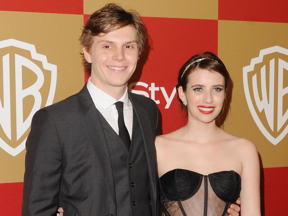 Evan Peters and actress Emma Roberts arrive at the InStyle And Warner Bros. Golden Globe Party at The Beverly Hilton Hotel on January 13, 2013 in Beverly Hills, California