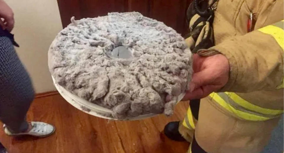 A huge pile of lint found in the family's clothes dryer was the source of the 'burning smell'. Source: Berowra Rural Fire Brigade
