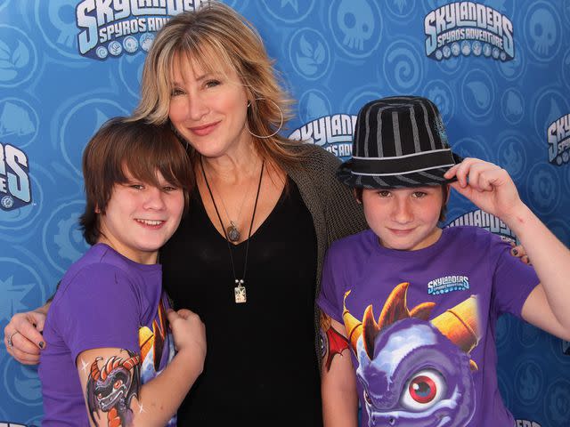 <p>Paul Redmond/WireImage</p> Lisa Ann Walter and sons Spencer and Simon arrive at Skylanderss Spyro's Adventure Halloween Event on October 29, 2011 in Los Angeles, California.