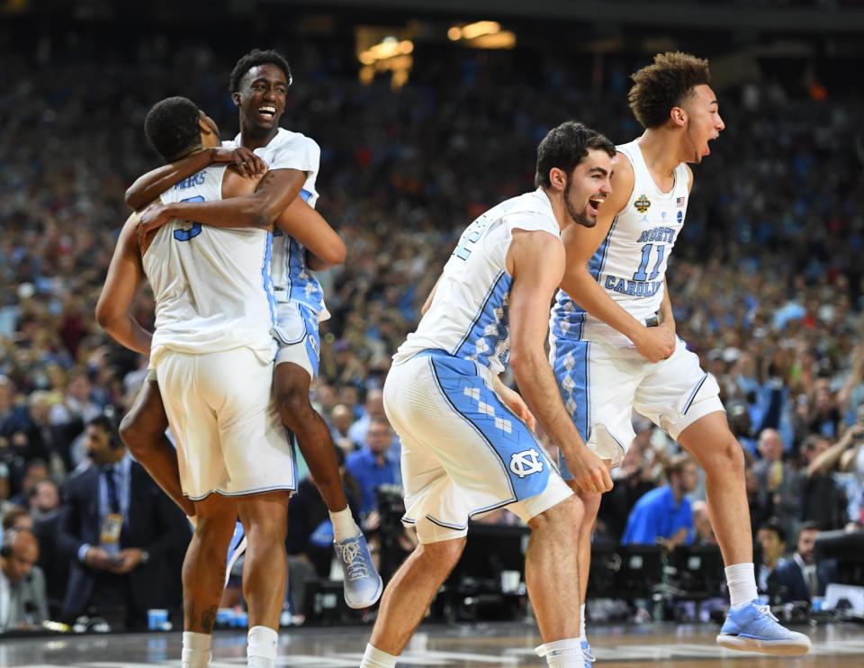 <p>North Carolina Tar Heels players celebrate after defeating the Gonzaga Bulldogs in the championship game of the 2017 NCAA Men’s Final Four at University of Phoenix Stadium. Mandatory Credit: Bob Donnan-USA TODAY Sports </p>