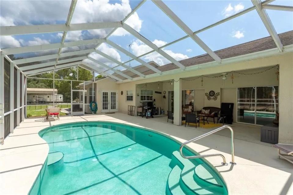 The covered pool. EXP REALTY LLC