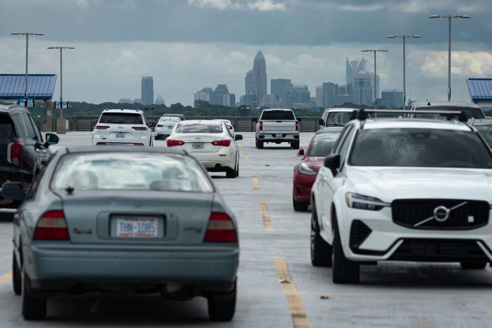 The uptown Charlotte skyline is shown from the seventh-floor roof of the hourly parking deck at Charlotte Douglas International Airport. Parking fees are increasing on Nov. 6.