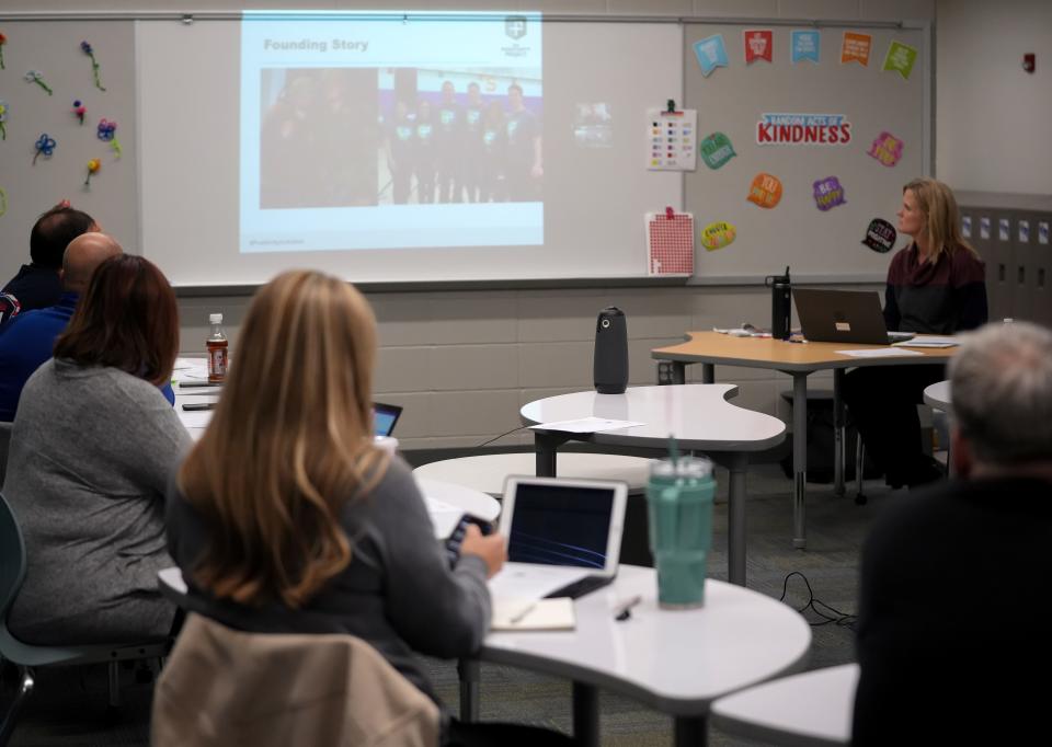 Members of the Van Meter Board of Education see a video presentation during a regular school board meeting on Wednesday, Nov. 16, 2022, in Van Meter.