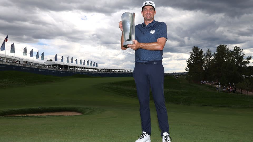 Bradley poses with the BMW Championship trophy after victory in Castle Rock, Colorado. - Christian Petersen/Getty Images