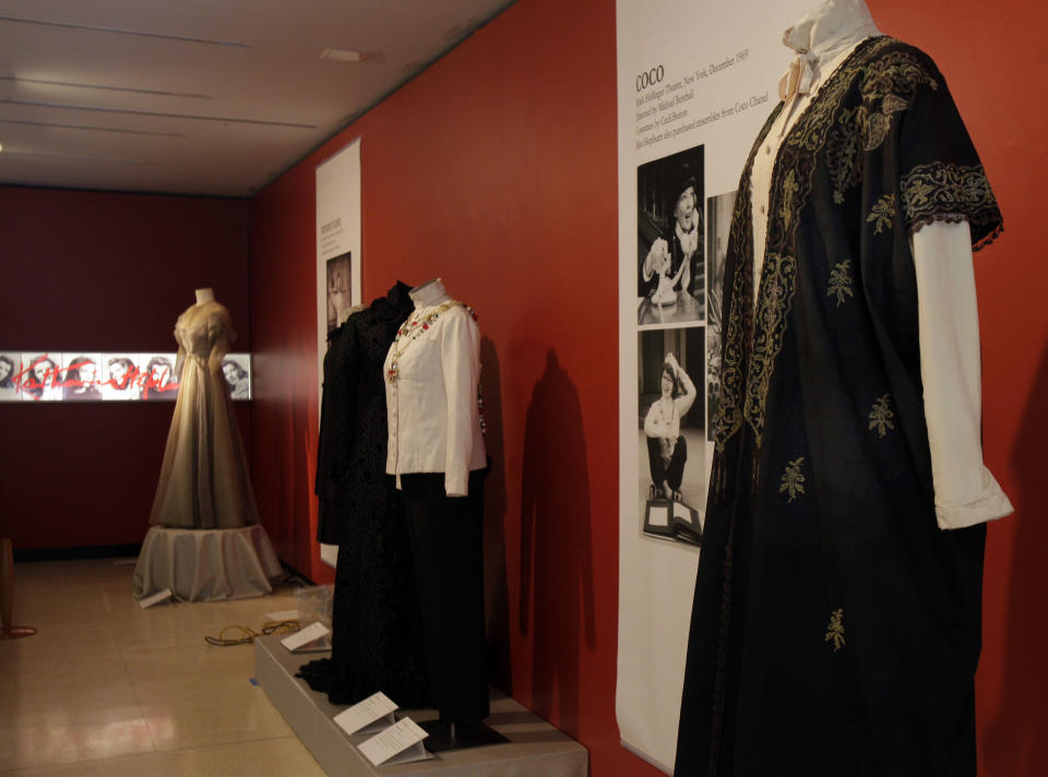 A design by Jane Greenwood, right, from the 1976 production of "A Matter of Gravity," is shown as part of the "Katharine Hepburn: Dressed for Stage and Screen" exhibit in the New York Public Library for the Performing Arts at Lincoln Center, Tuesday, Oct. 16, 2012. (AP Photo/Richard Drew)