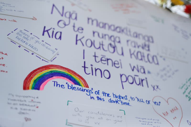 Messages are seen at a memorial at the harbour in Whakatane, following the White Island volcano eruption in New Zealand