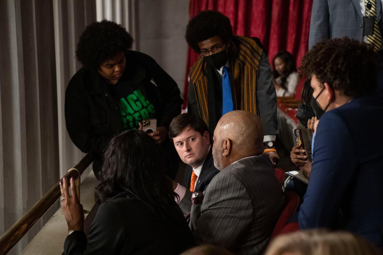 Rodney Wells, and RowVaughn Wells, parents of Tyre Nichols, speak with Rep. John Gillespie, R- Memphis, while Rep. Justin Pearson, D-Memphis stands by during a House session at the State Capitol in Nashville , Tenn., Monday, March 4, 2024.