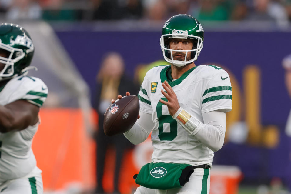 London, United Kingdom - October 6: Aaron Rodgers of New York Jets controls the ball during the NFL match between New York Jets and Minnesota Vikings at Tottenham Hotspur Stadium on October 6, 2024 in London, England. (Photo by Mario Hommes/DeFodi Images via Getty Images)