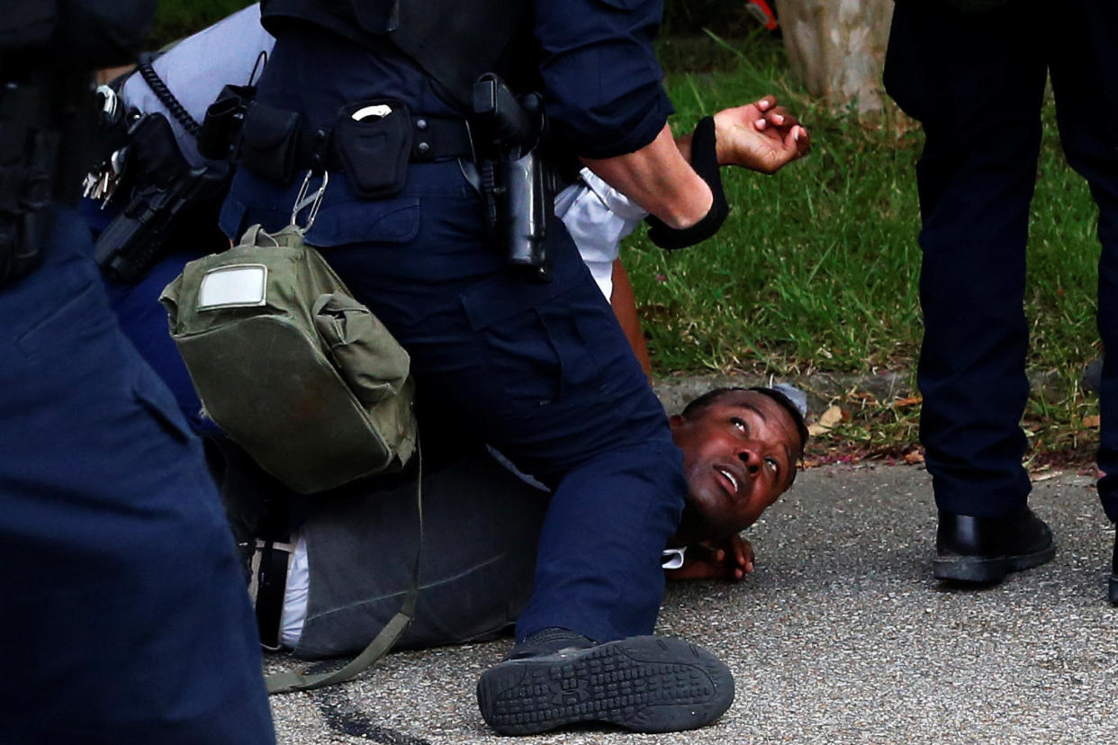 A demonstrator is detained during protests in Baton Rouge, Louisiana, U.S., July 10, 2016.  REUTERS/Shannon Stapleton     TPX IMAGES OF THE DAY     