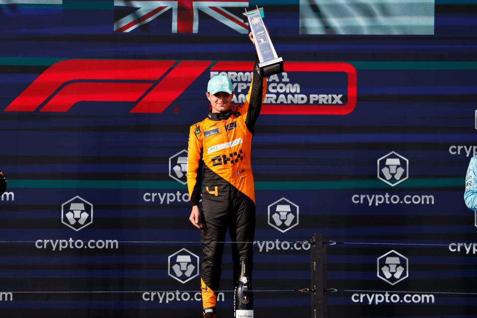 Lando Norris poses with the trophy after winning the Miami Grand Prix on Sunday for his first career Formula One victory.