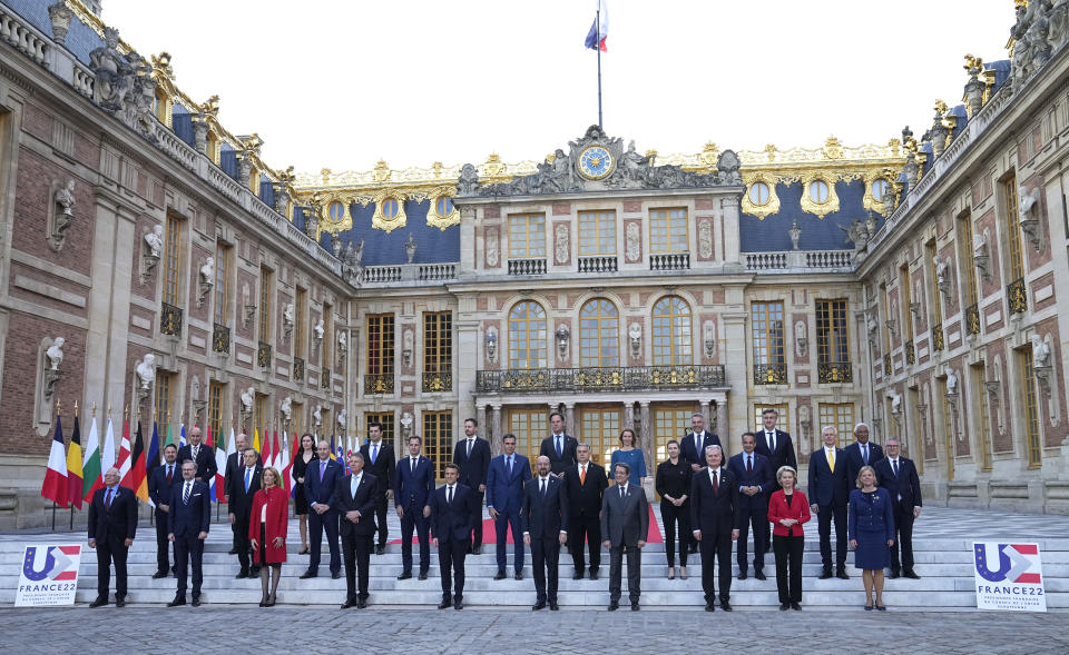 European Union leaders pose for a group photo at an EU summit at the Chateau de Versailles, in Versailles, west of Paris, Thursday, March 10, 2022. European Union leaders on Thursday will focus on how to help Ukraine in its war with Russia, but the measures discussed are expected to stop short of fulfilling the country's hopes it can soon join the bloc. (AP Photo/Michel Euler)