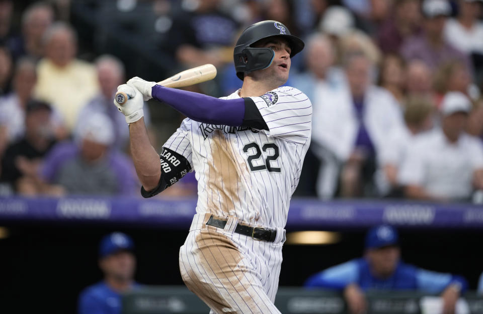 Colorado Rockies' Sam Hilliard watches his three-run home run off Kansas City Royals starting pitcher Carlos Hernandez during the third inning of a baseball game Saturday, May 14, 2022, in Denver. (AP Photo/David Zalubowski)