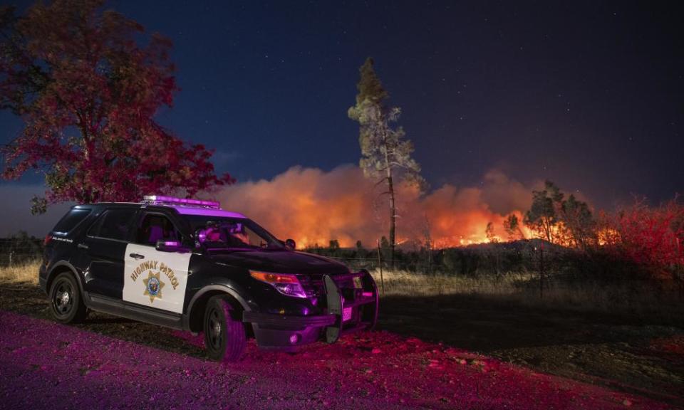 <span>Photograph: Ethan Swope/AP</span>