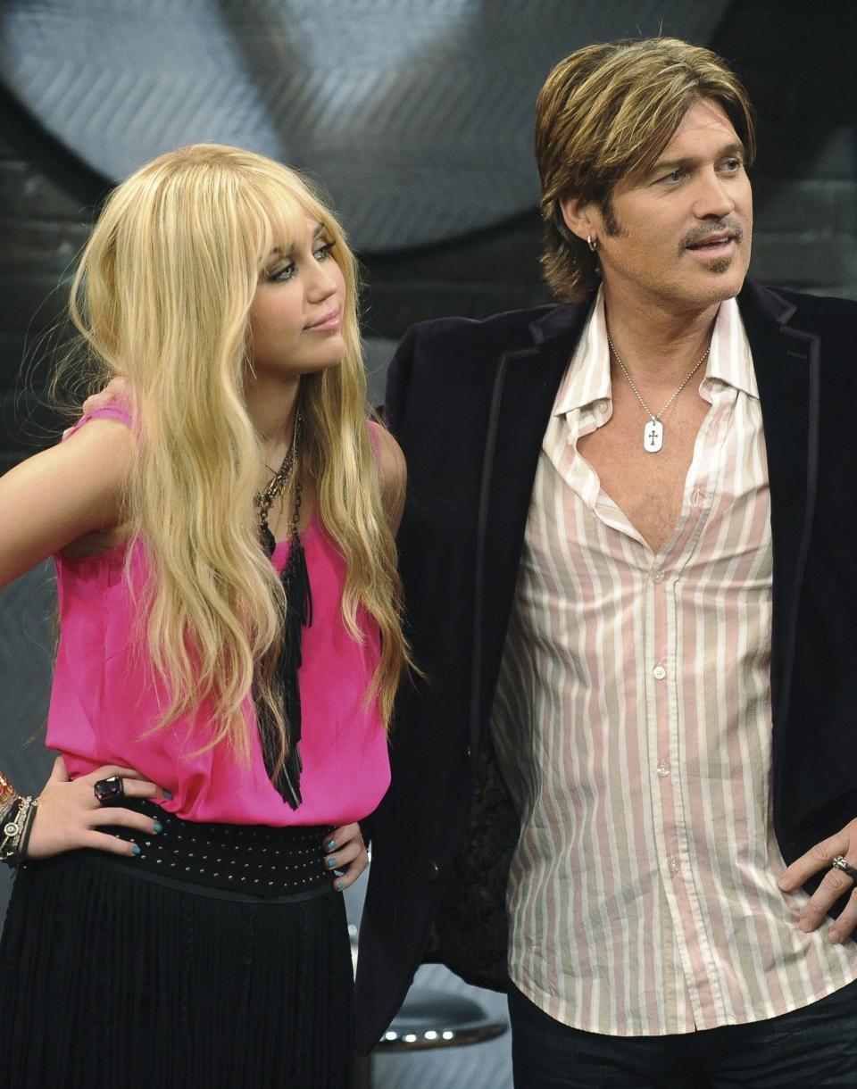 Close-up of a younger Miley and Billy Ray