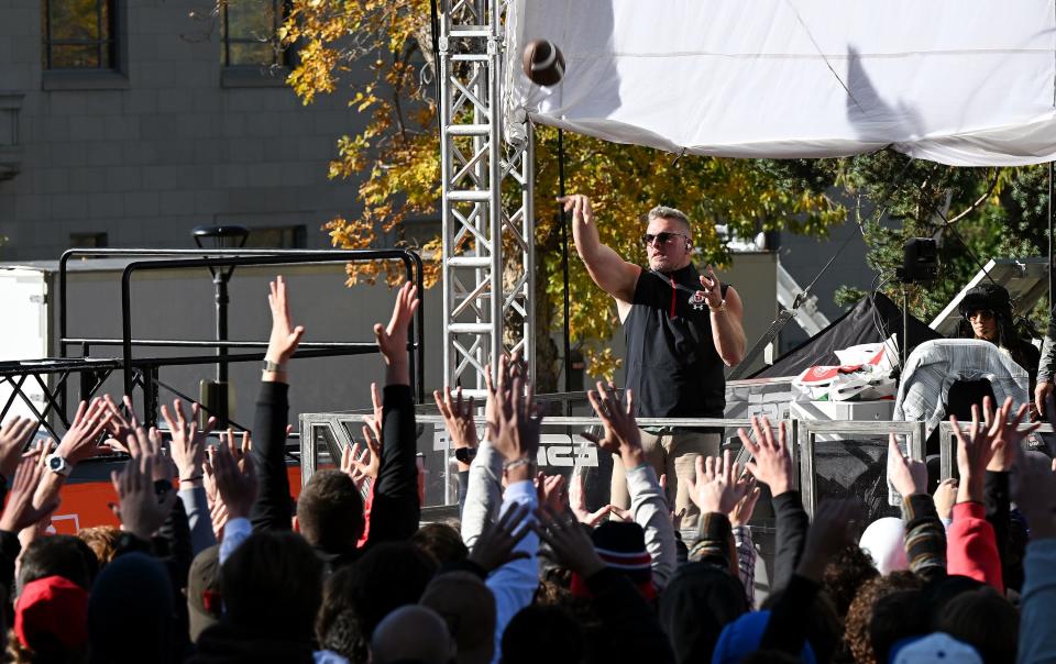 Pat McAfee tosses a football out to the crowd during his television his show at the University of Utah in Salt Lake City on Friday, Oct. 27, 2023. | Scott G Winterton, Deseret News