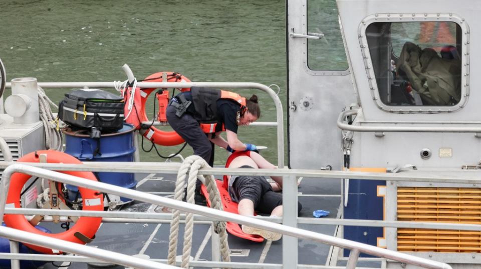An NYPD Harbor Unit took the man to shore. William Farrington