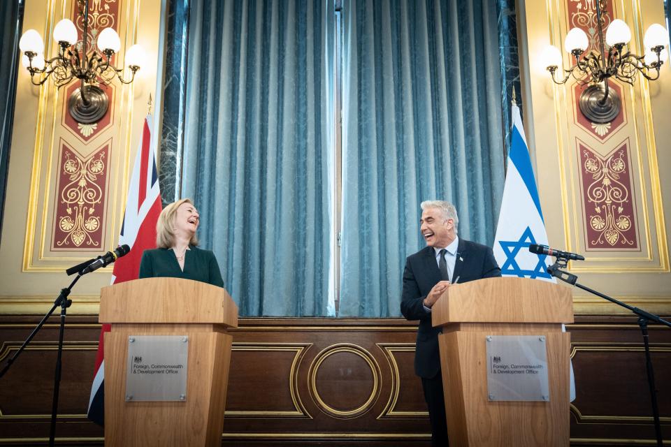 Foreign Secretary Liz Truss and Israeli Foreign Minister Yair Lapid hold a press conference (PA)
