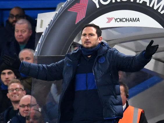 Lampard watches from the touchline during Chelsea's 2-2 draw with Arsenal (EPA)