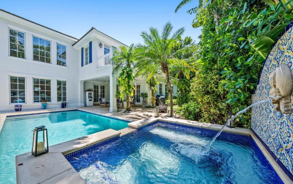 A swimming pool with a fountain is focal point in the backyard of a Palm Beach house at 271 La Puerta Way, which just changed hands for a recorded $13 million. It last sod for a recorded $6.865 million in November 2020.