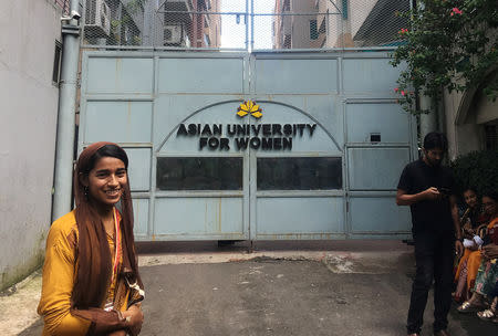 Formin Akter, a Rohingya refugee girl, stands outside the gates of the Asian University for Women on her first day of college in Chittagong, Bangladesh August 26, 2018. Picture taken August 26, 2018. REUTERS/Zeba Siddiqui