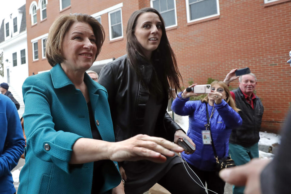 Democratic presidential candidate Sen. Amy Klobuchar, D-Minn., walks to a campaign event, Monday, Feb. 10, 2020, in Exeter, N.H. (AP Photo/Elise Amendola)