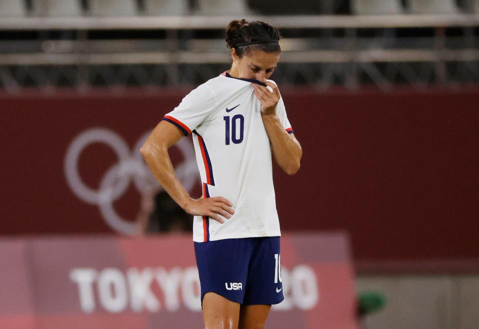 Carli Lloyd reacts after the U.S. women's national team's loss to Canada.