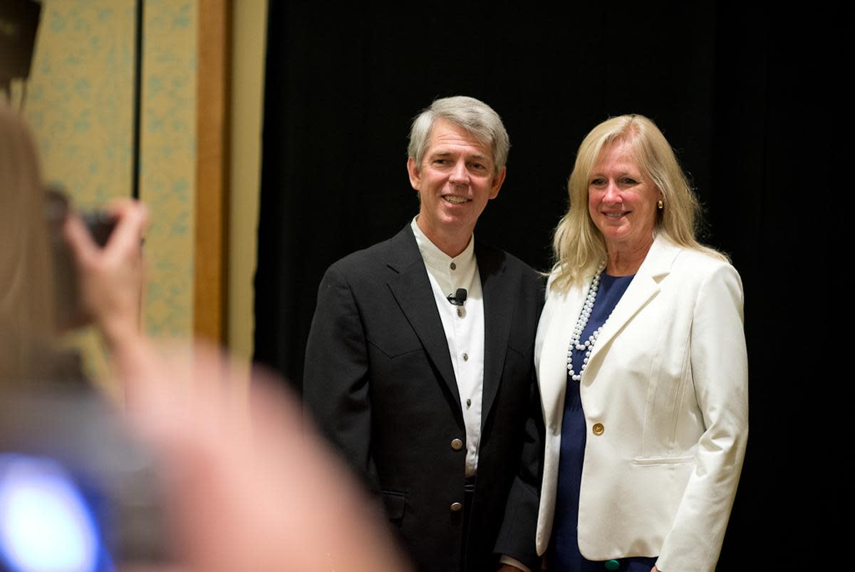 David Barton, left, of WallBuilders, poses for photos at a Texas Eagle Forum reception at the Texas Republican Convention in Fort Worth on June 7, 2012.