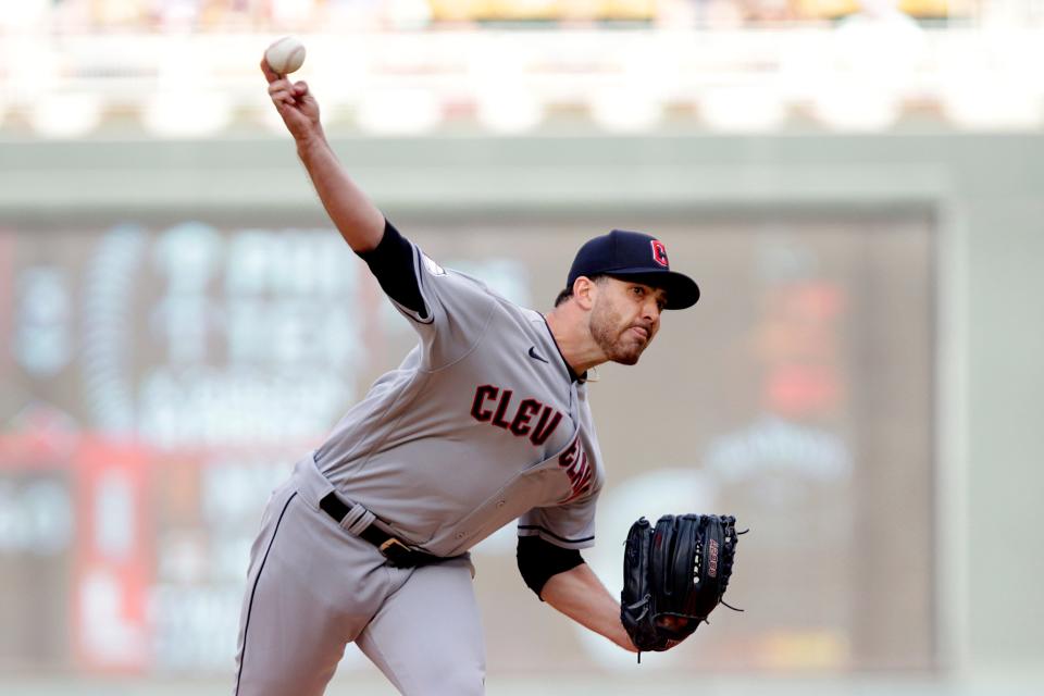 Cleveland Guardians pitcher Aaron Civale throws to the Minnesota Twins in the first inning of a baseball game Tuesday, June 21, 2022, in Minneapolis. (AP Photo/Andy Clayton-King)