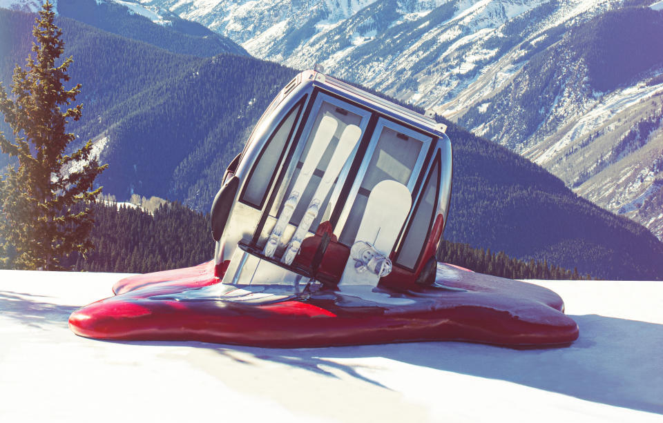 In this undated photo provided by Aspen Skiing Company, an art piece titled, "The Melted Gondola," sits atop Aspen Mountain ski area in Colorado to remind visitors of the urgent need to address climate change. "The Melted Gondola" was fabricated by artist Chris Erikson. (Mark Carolan/Aspen Skiing Company via AP)