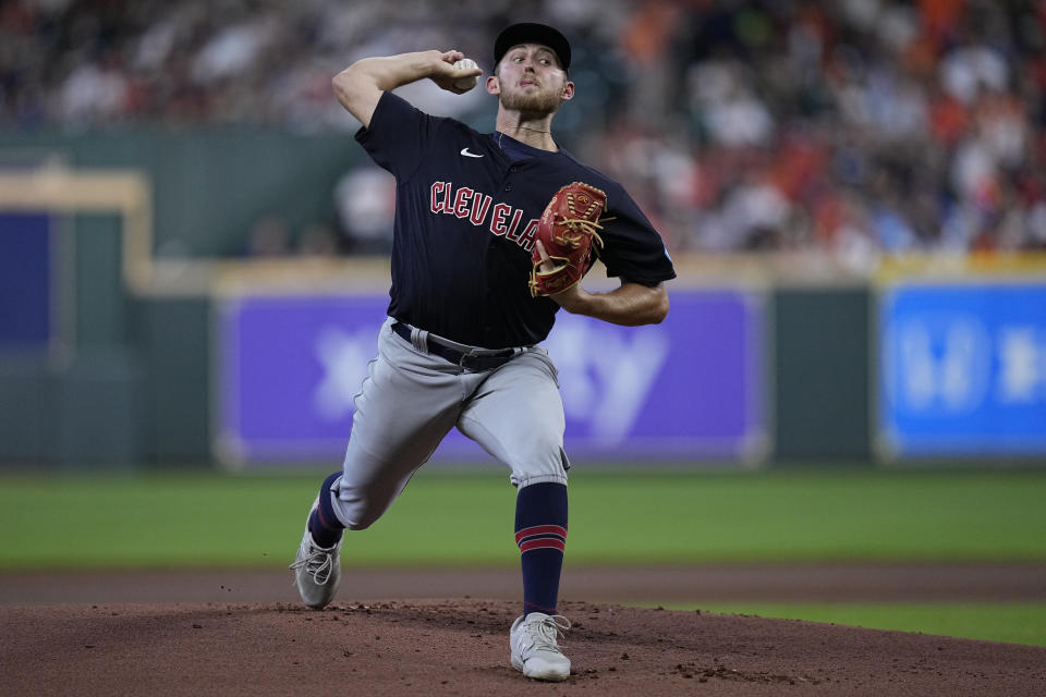 Cleveland Guardians starting pitcher Tanner Bibee delivers during the first inning of a baseball game against the Houston Astros, Wednesday, Aug. 2, 2023, in Houston. (AP Photo/Kevin M. Cox)