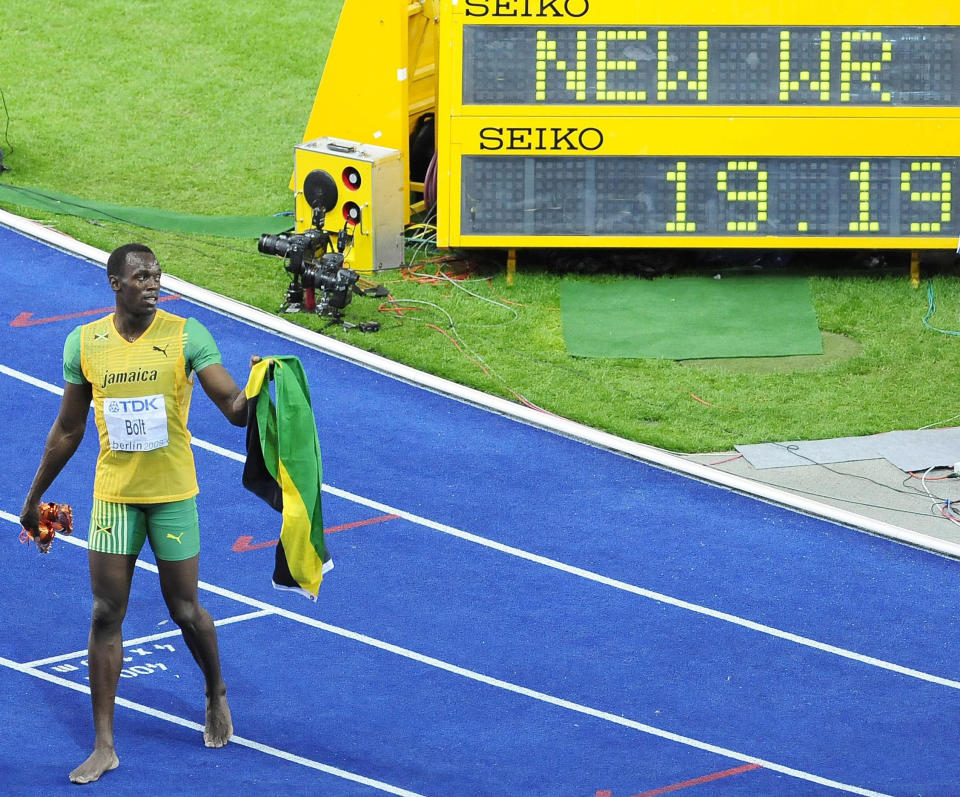 Jamaica's Usain Bolt sets a new World Record to win the Men's 200m Final during the IAAF World Championships at the Olympiastadion, Berlin. 