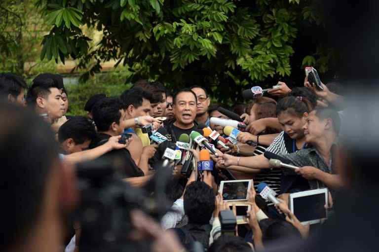 National police chief General Somyot Poompanmoung speaks to reporters outside the compound where police detained a suspect in the August 17 Bangkok shrine bombing, in a Bangkok suburb on August 29, 2015