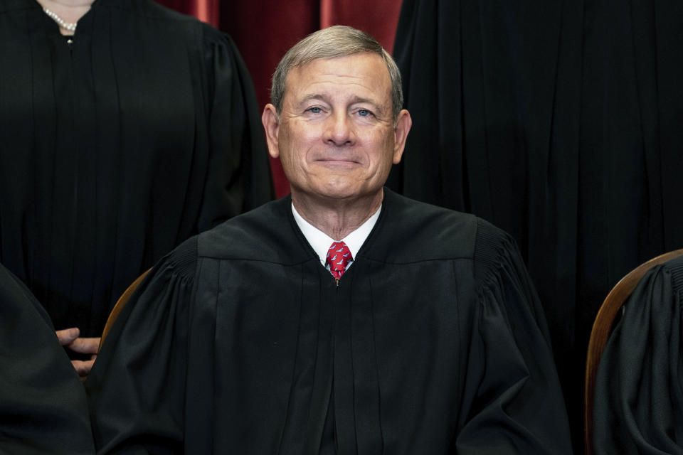 FILE - In this April 23, 2021, file photo Chief Justice John Roberts sits during a group photo at the Supreme Court in Washington. Less than 24 hours after the unprecedented leak of the draft opinion that overturned Roe v. Wade, Chief Justice John Roberts ordered an investigation into the “egregious breach.” Since then? Silence. The Supreme Court won’t say whether it is still investigating. (Erin Schaff/The New York Times via AP, Pool, File)