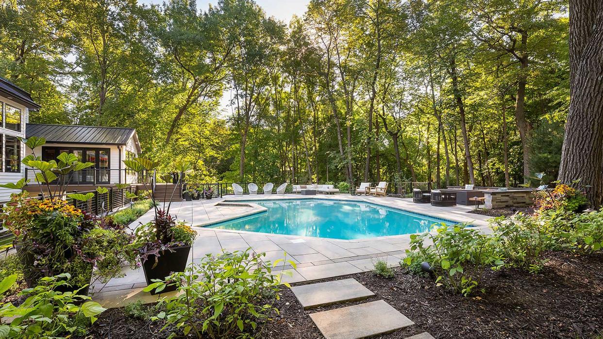  backyard pool with trees 