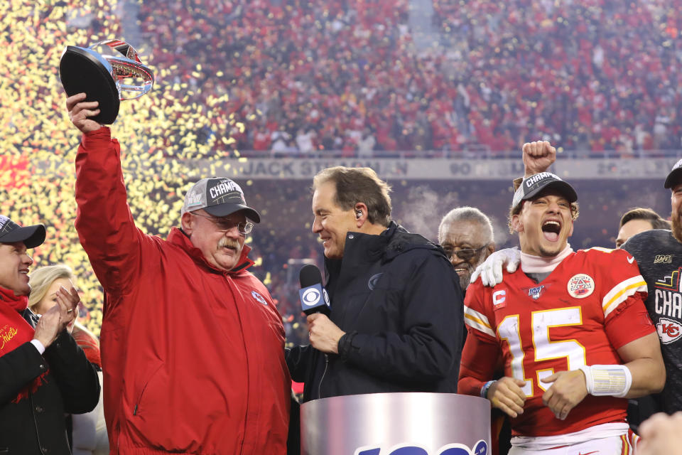 Kansas City Chiefs head coach Andy Reid lifts the Lamar Hunt Trophy over his head as quarterback Patrick Mahomes celebrates after winning the AFC championship on Jan. 19, 2020. (Photo by Scott Winters/Icon Sportswire via Getty Images)
