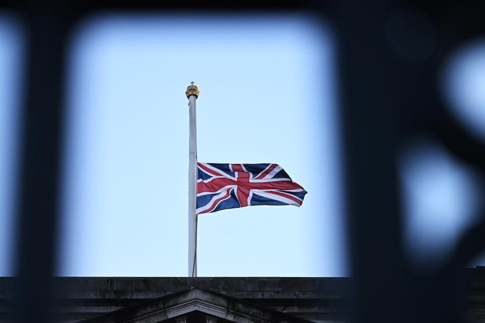The Union Flag flies at half mast at Buckingham Palace in honour of Queen Elizabeth II who died this afternoon on September 8, 2022